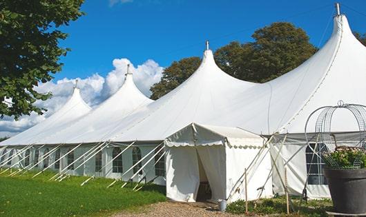 portable restrooms equipped for hygiene and comfort at an outdoor festival in Elsberry